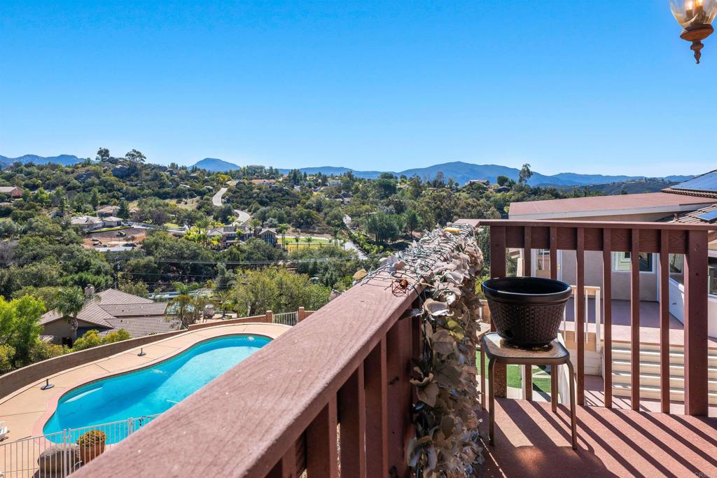 2016 South Grade Road Alpine, CA 91901 - Photo 14 of 27 a view of a balcony with two chairs and a table