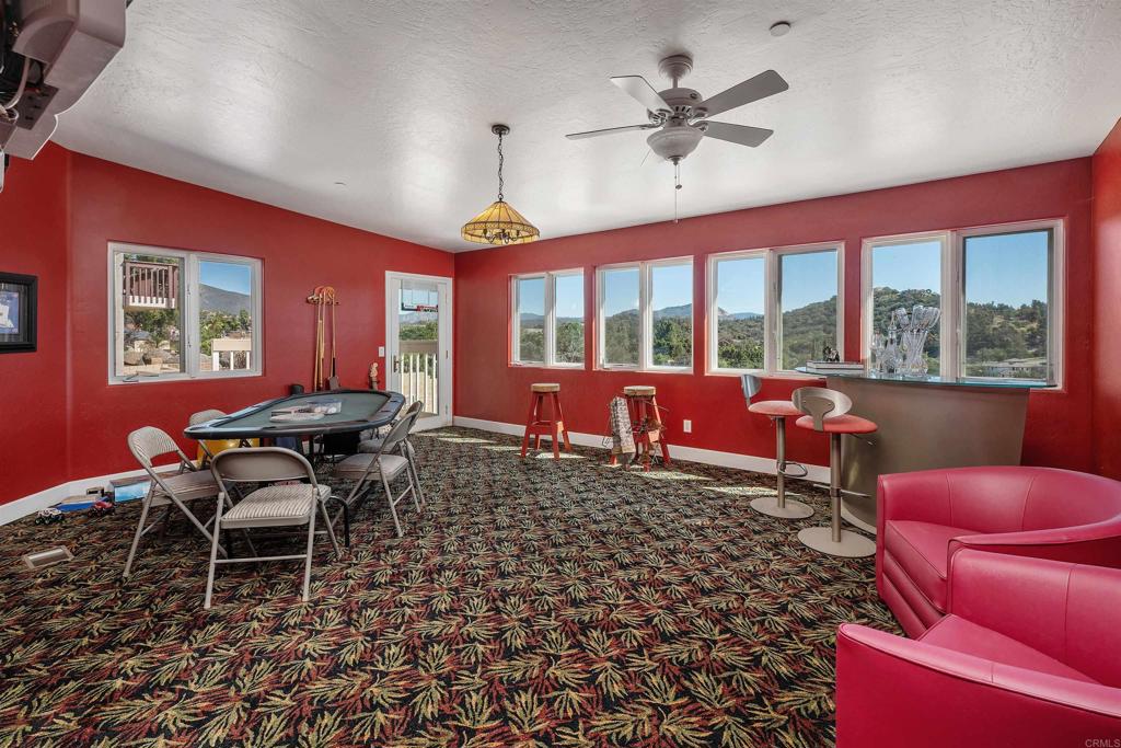 2016 South Grade Road Alpine, CA 91901 - Photo 19 of 27 a living room with furniture and a large window