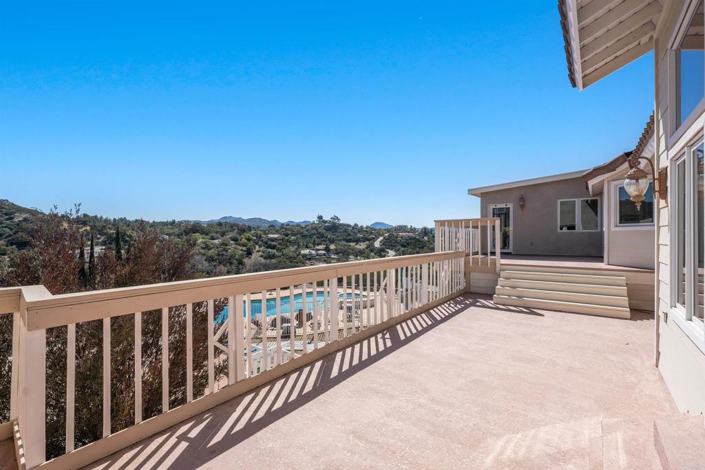 2016 South Grade Road Alpine, CA 91901 - Photo 21 of 27 a view of a balcony with wooden fence and floor