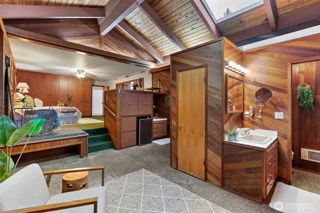a view of a storage room with wooden floor