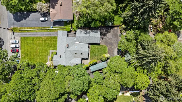an aerial view of residential house with an outdoor space