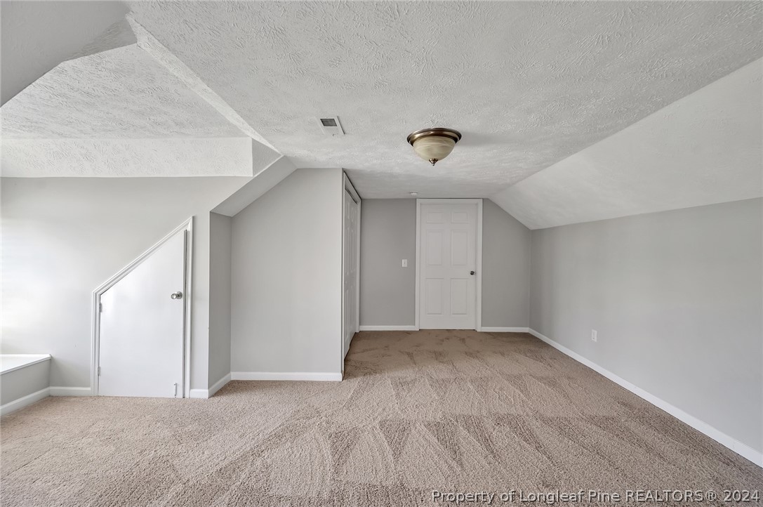 3713 Glenn Road Parkton, NC 28371 - Photo 4 of 17 a view of an empty room with a window