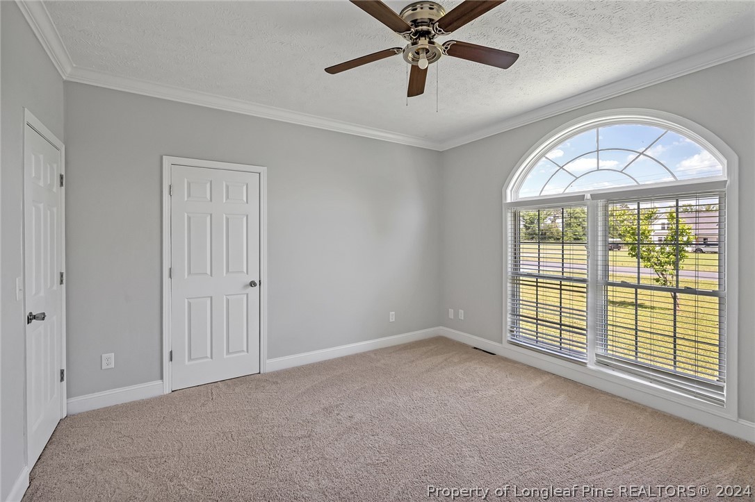3713 Glenn Road Parkton, NC 28371 - Photo 9 of 17 a view of an empty room with a window