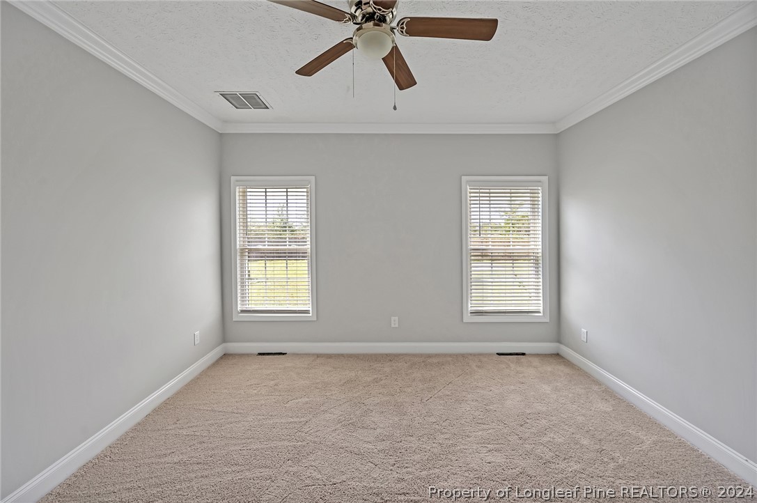 3713 Glenn Road Parkton, NC 28371 - Photo 10 of 17 a view of an empty room with a window