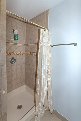 a kitchen with a sink cabinets and stainless steel appliances