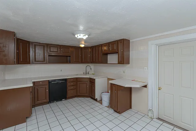 a utility room with cabinets