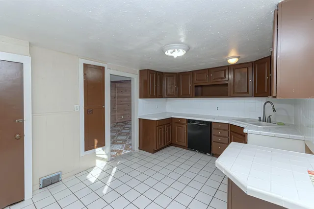 a view of a hallway with a chandelier