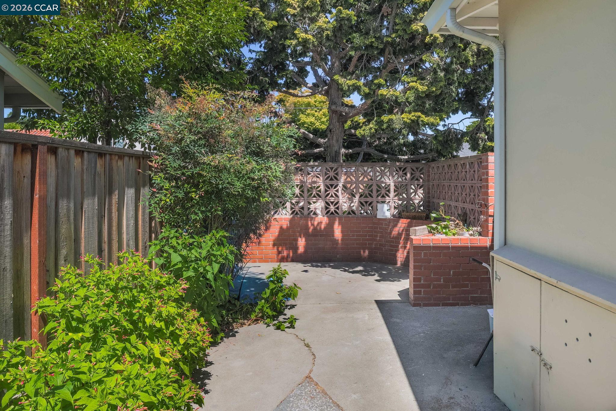 1051 San Rafael Street San Leandro, CA 94577 - Photo 24 of 26 a view of a pathway with a yard