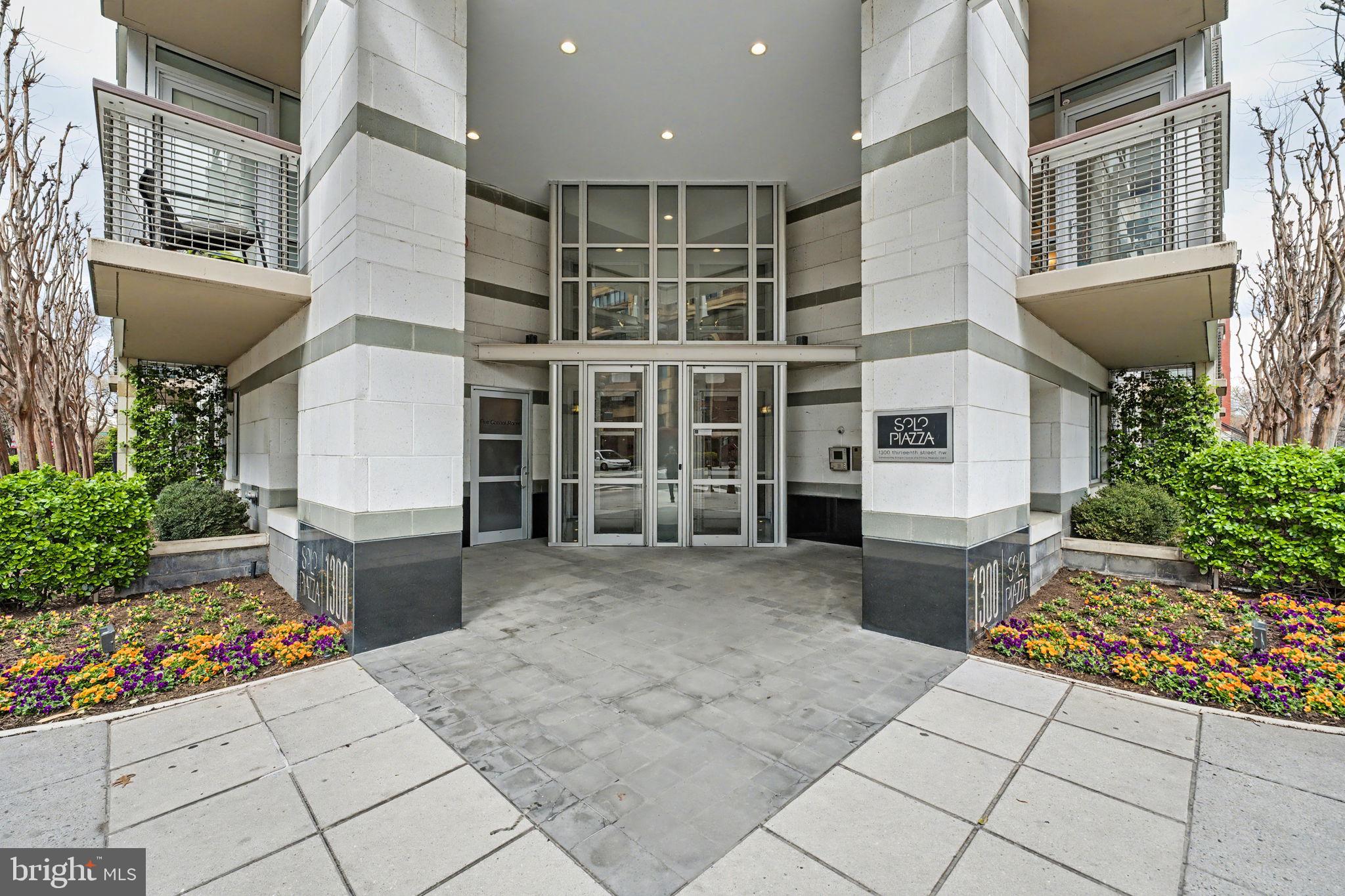 1300 13th Street Northwest, Unit 603 Washington, DC 20005 - Photo 1 of 26 a view of a entryway with flower pots