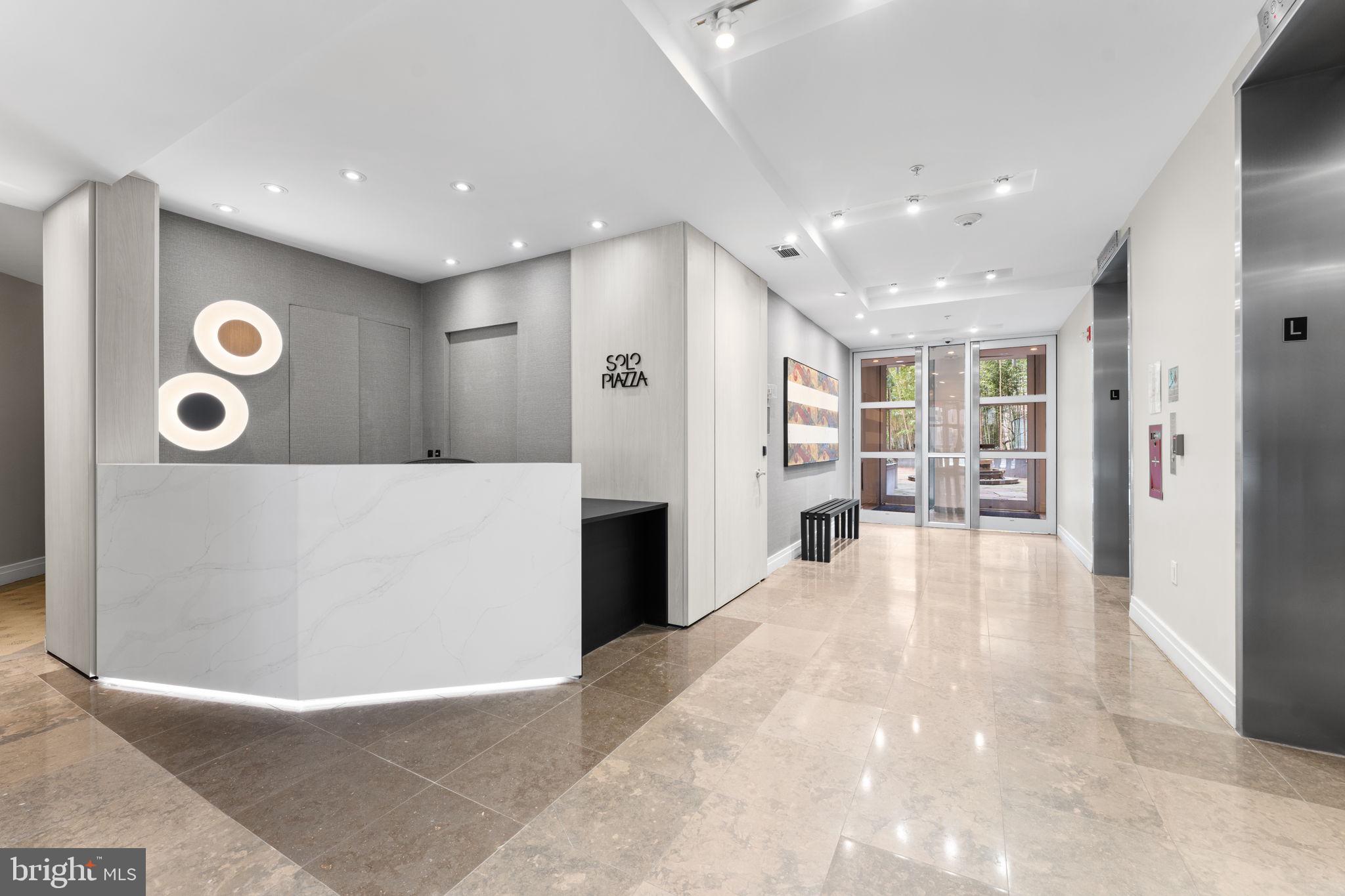 1300 13th Street Northwest, Unit 603 Washington, DC 20005 - Photo 19 of 26 a view of a big room with wooden floor and windows