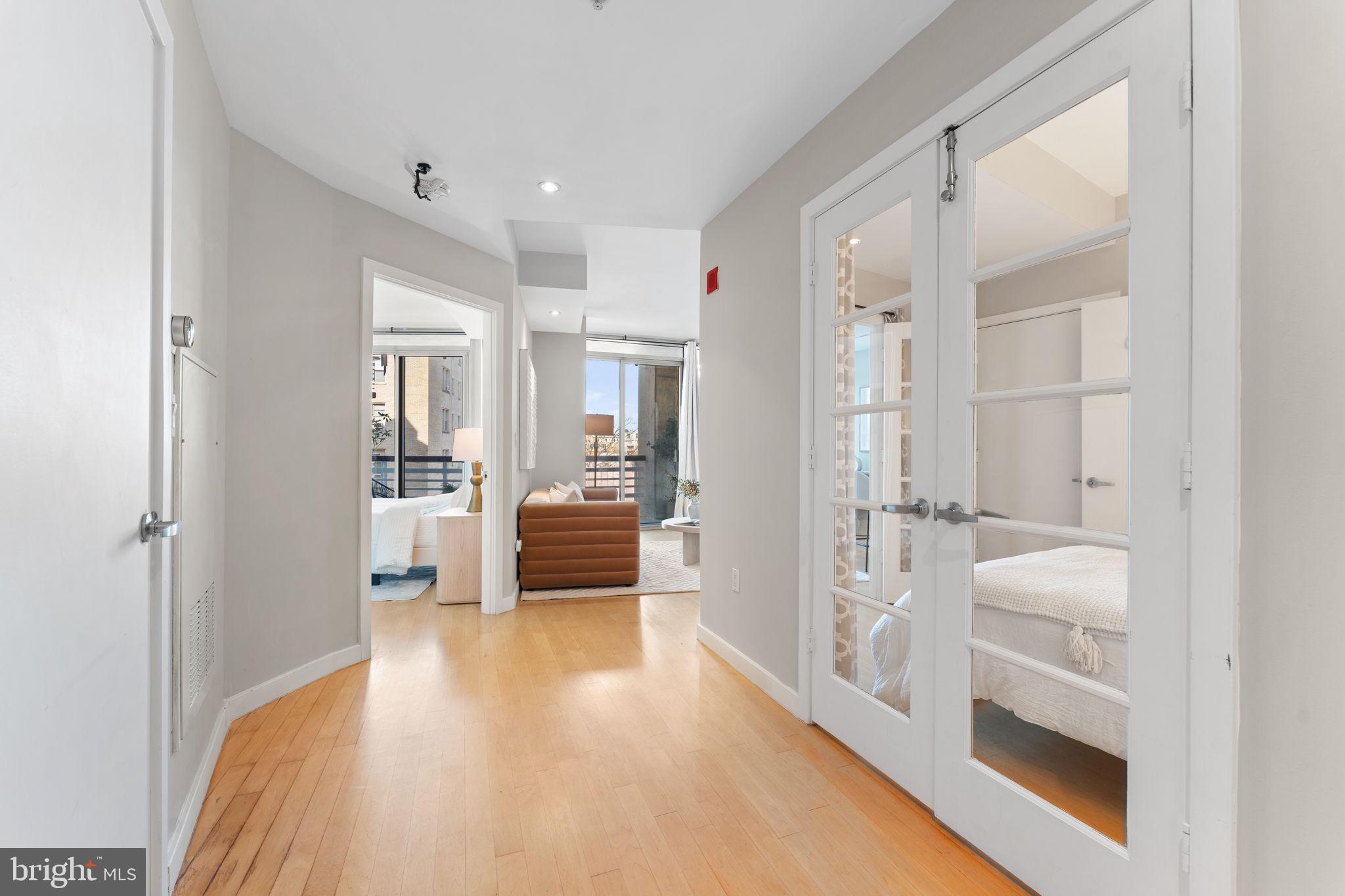 1300 13th Street Northwest, Unit 603 Washington, DC 20005 - Photo 2 of 26 a bathroom with a tub and shower