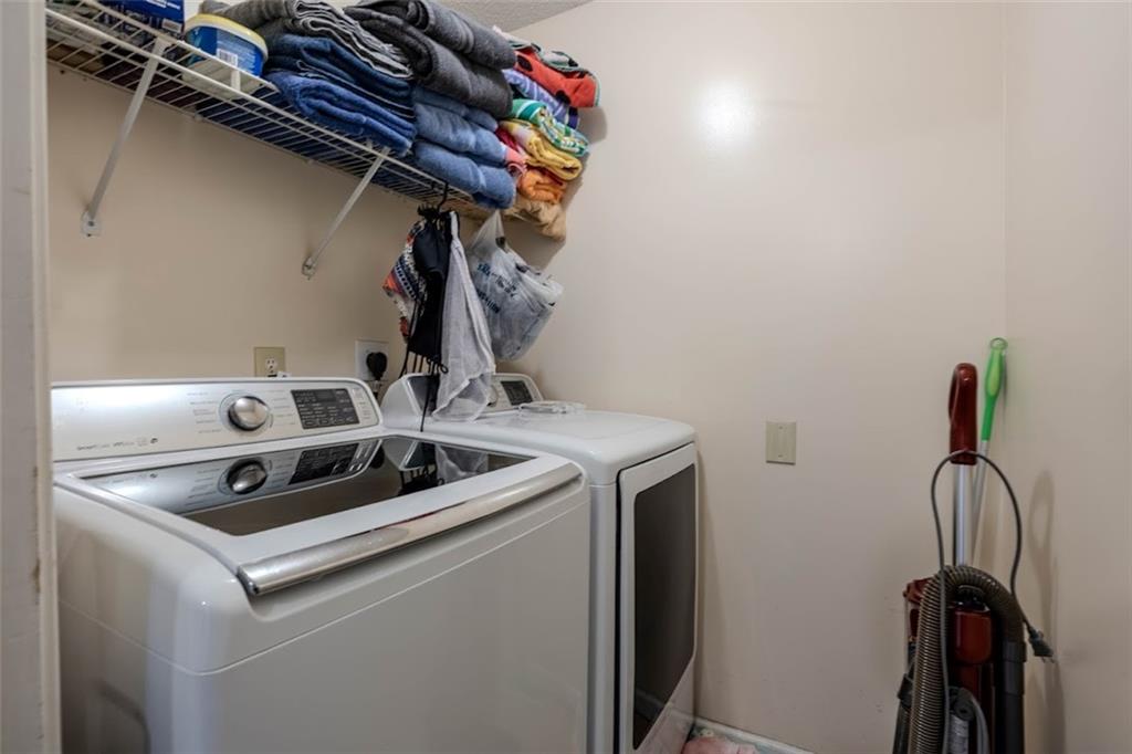 15 Oakcrest Trail Northeast Rome, GA 30165 - Photo 11 of 22 a utility room with dryer and washer
