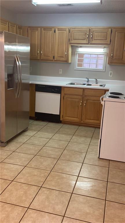 15 Oakcrest Trail Northeast Rome, GA 30165 - Photo 20 of 22 a kitchen with stainless steel appliances granite countertop a sink and cabinets