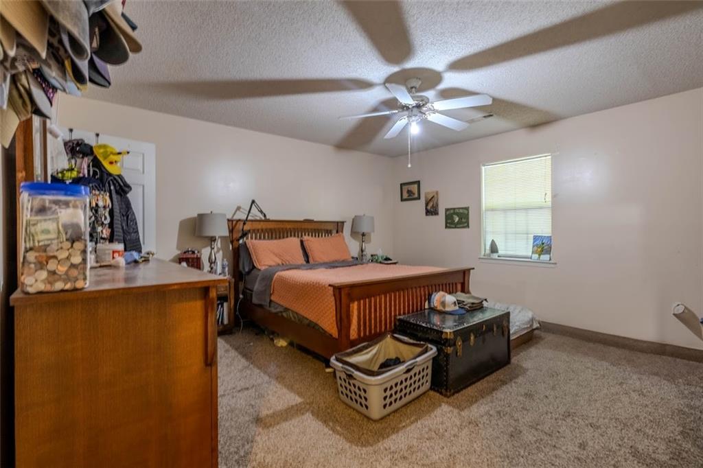 15 Oakcrest Trail Northeast Rome, GA 30165 - Photo 8 of 22 a bedroom with bed and window