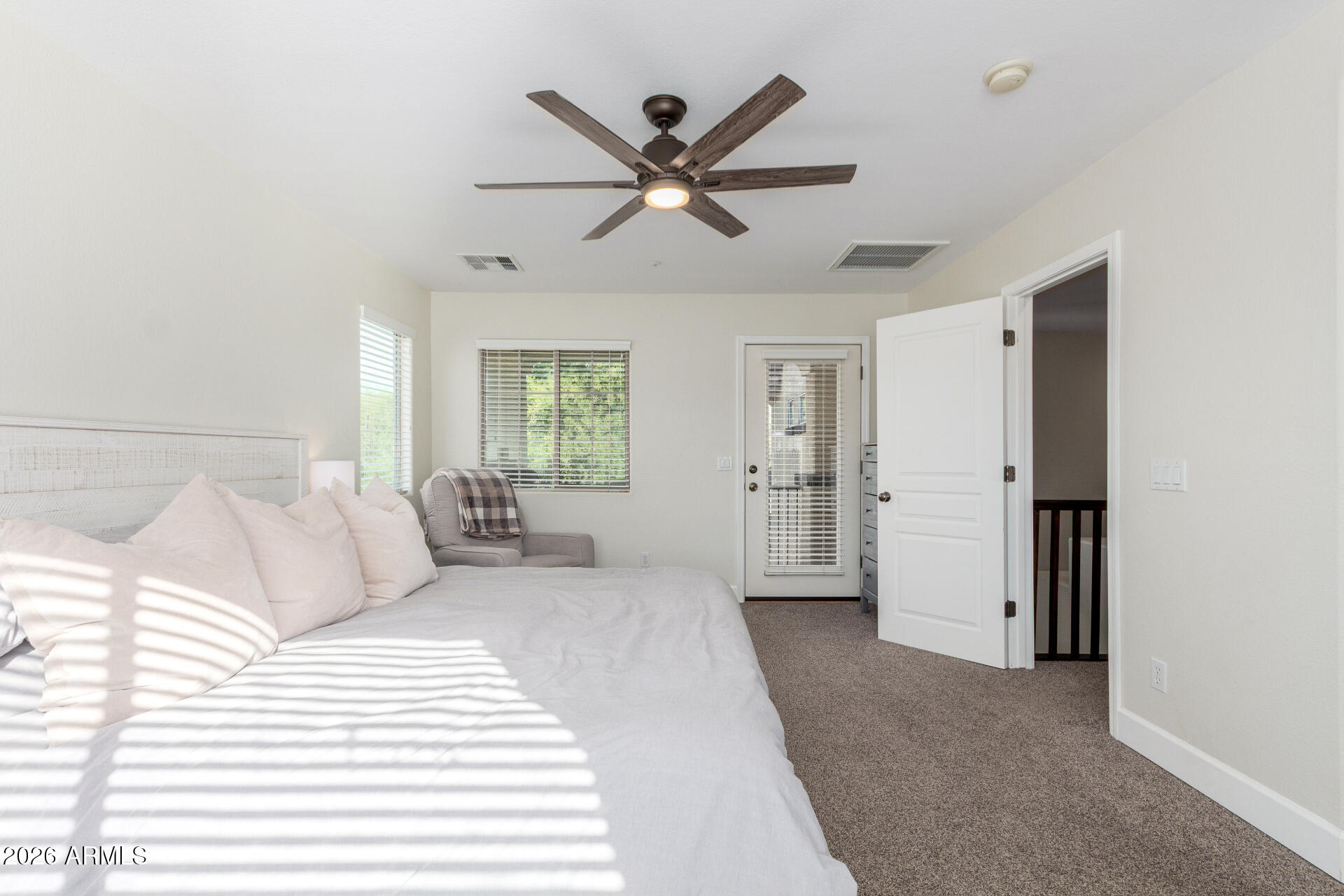 1519 East Elgin Street Gilbert, AZ 85295 - Photo 17 of 36 a living room with a bed and window