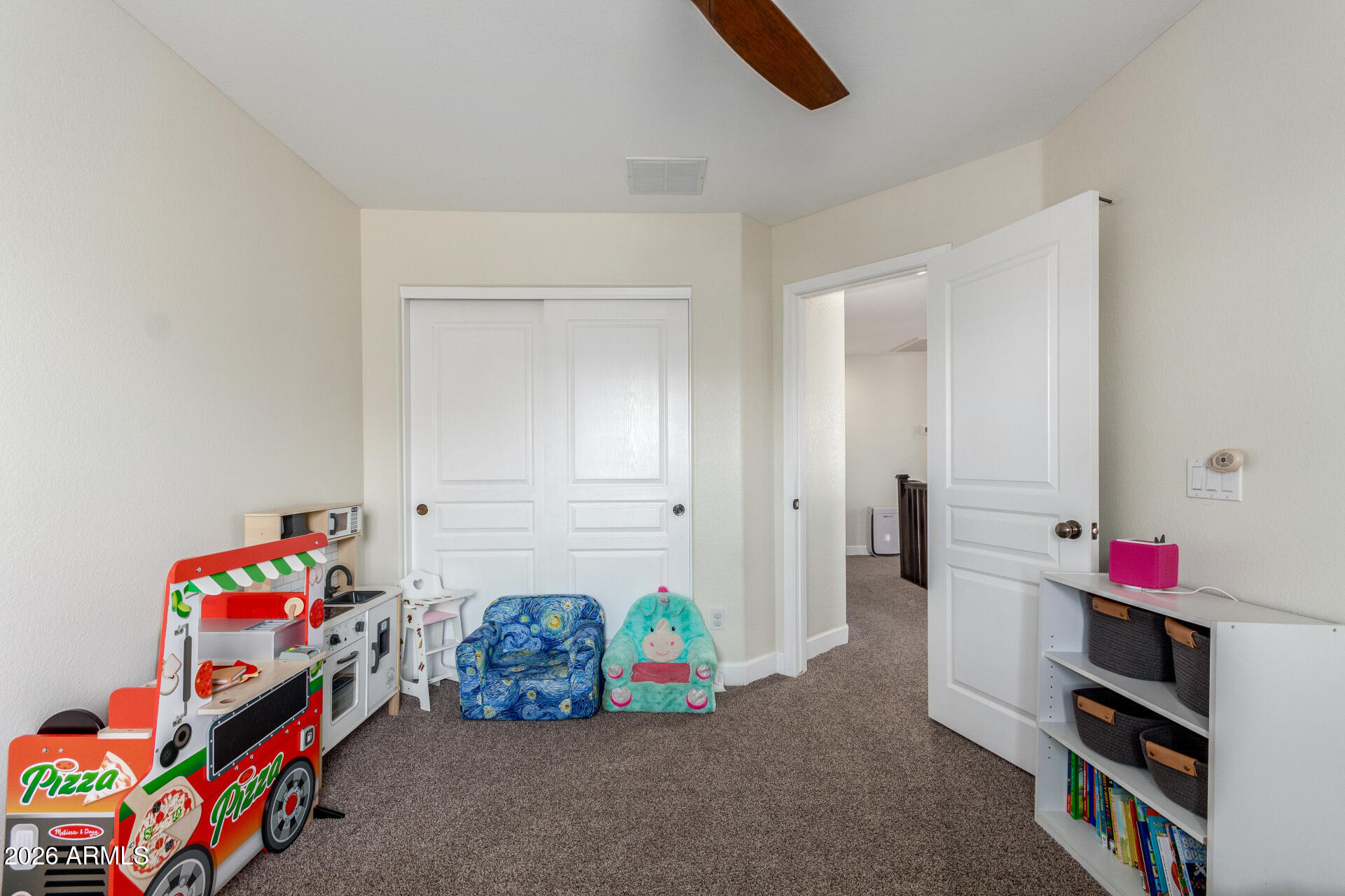 1519 East Elgin Street Gilbert, AZ 85295 - Photo 25 of 36 a bedroom with bed and closet