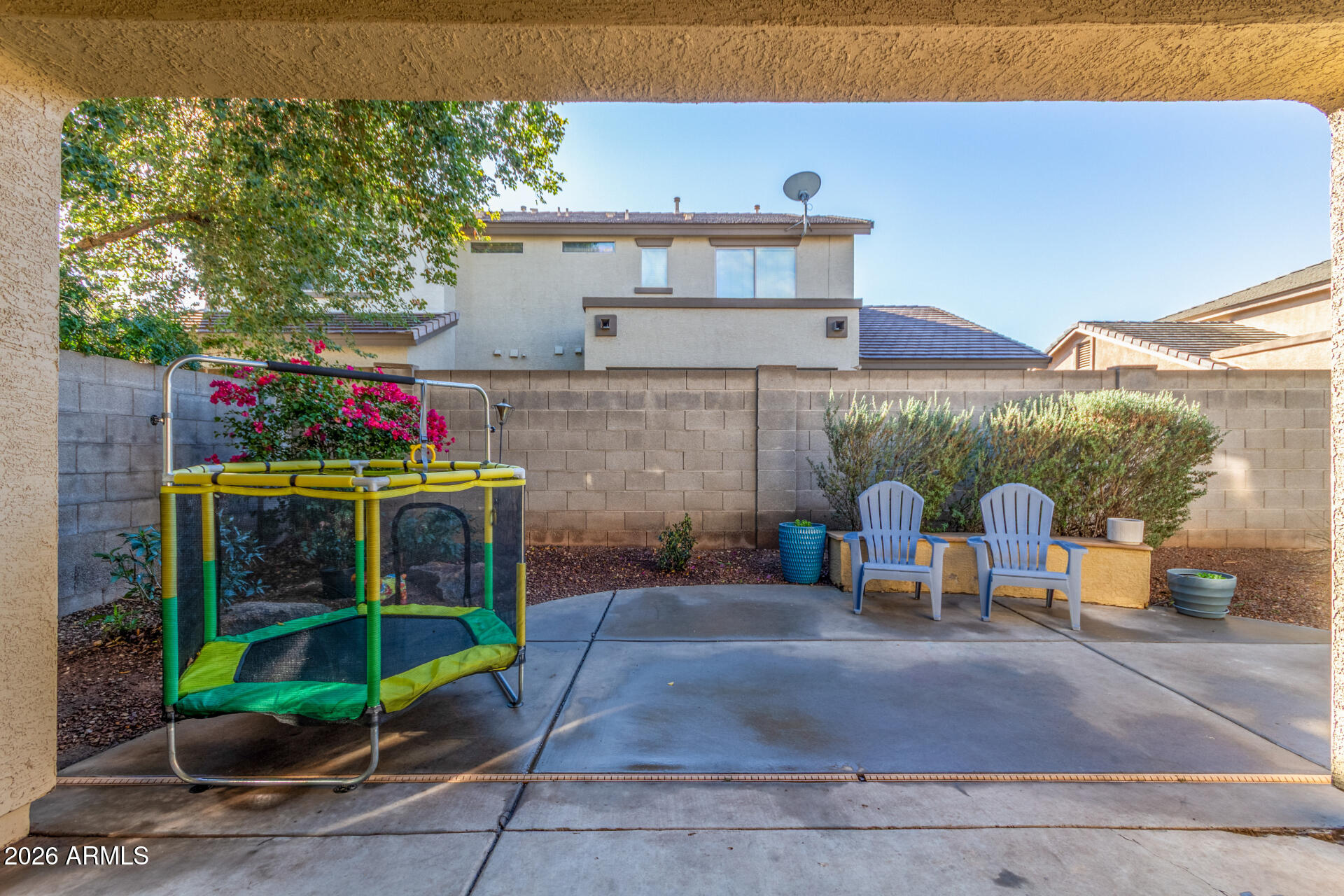 1519 East Elgin Street Gilbert, AZ 85295 - Photo 30 of 36 a view of a chair and tables in the patio