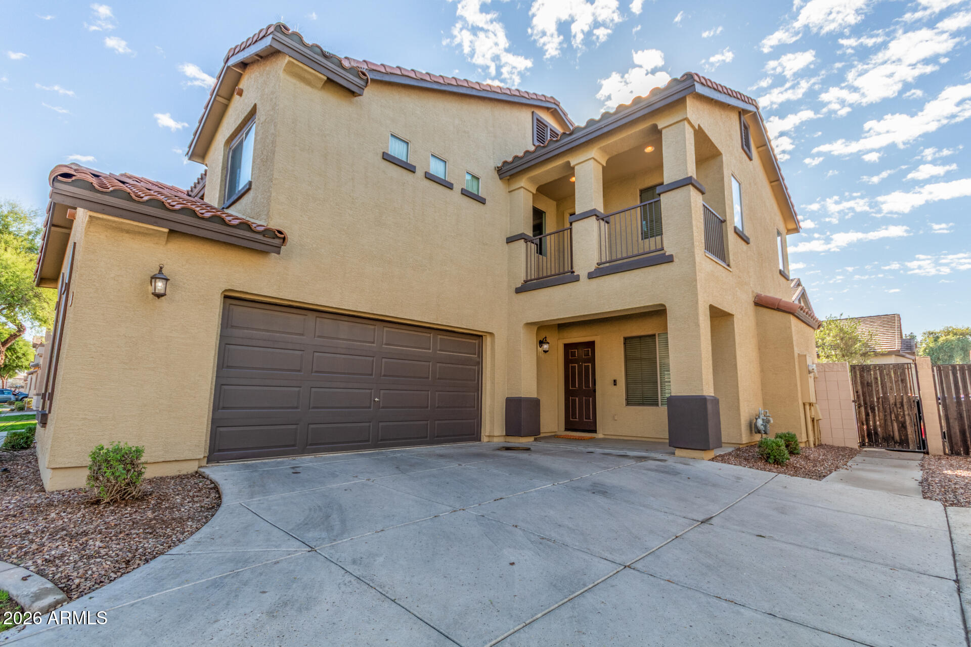 1519 East Elgin Street Gilbert, AZ 85295 - Photo 3 of 36 a view of a house with a garage