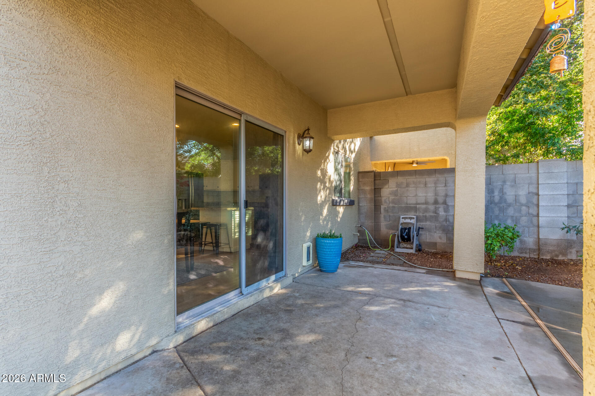 1519 East Elgin Street Gilbert, AZ 85295 - Photo 32 of 36 a view of an entrance with a table and chairs