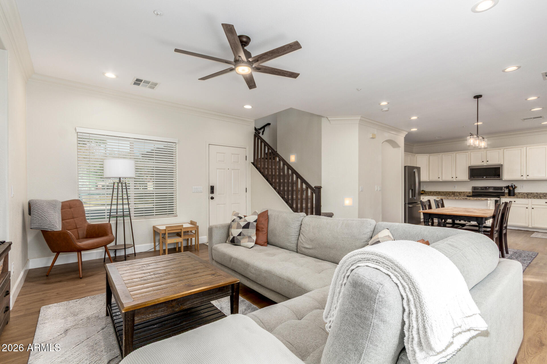 1519 East Elgin Street Gilbert, AZ 85295 - Photo 6 of 36 a living room with furniture and a large window