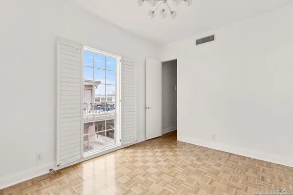 an empty room with cabinet