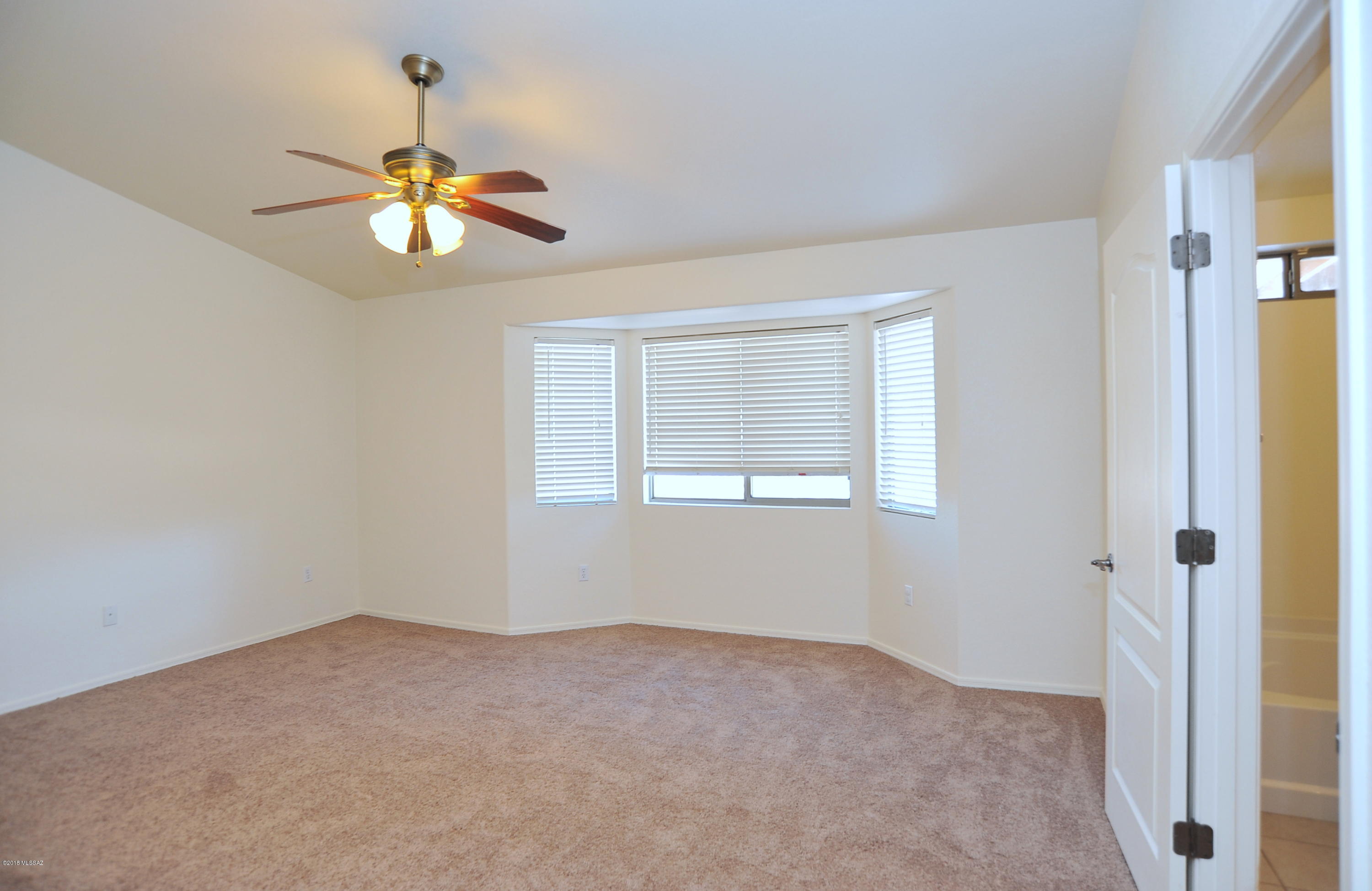 558 West Chatfield Street Vail, AZ 85641 - Photo 15 of 31 a view of an empty room with a window