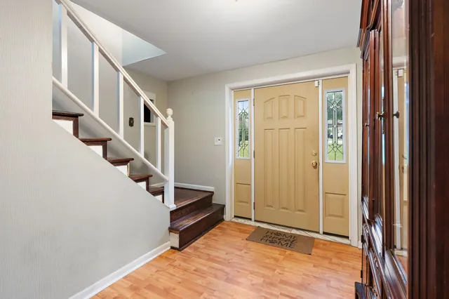 a view of entryway with stairs