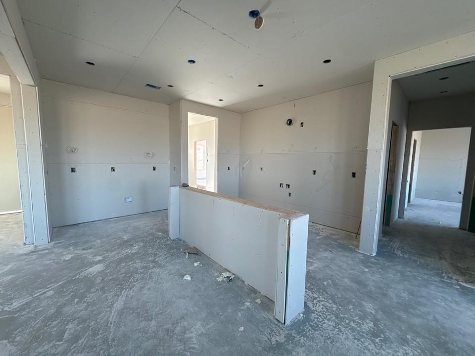 154 Snowy Owl Trail Rhome, TX 76078 - Photo 8 of 13 a view of an empty room