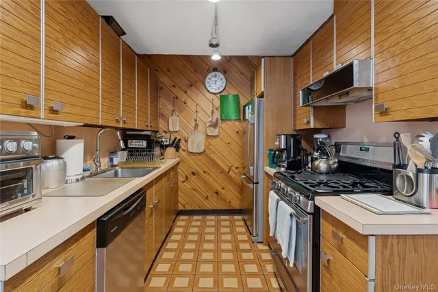 a bathroom with a sink a mirror and a toilet