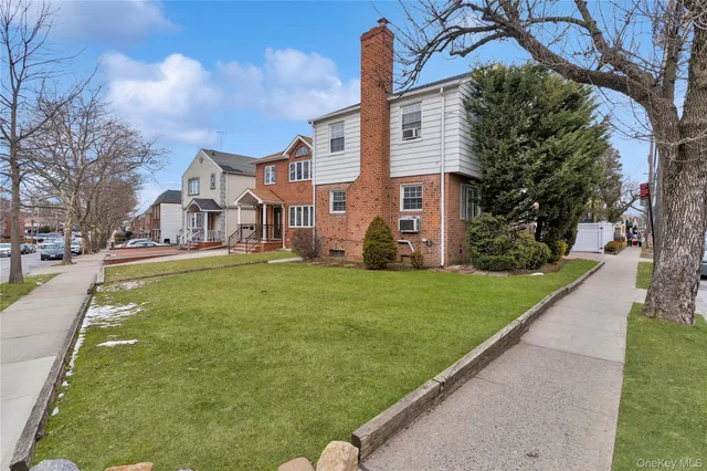 a kitchen with a table chairs and a refrigerator