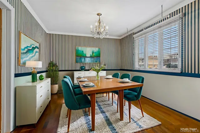 a kitchen with stainless steel appliances a stove a sink a refrigerator wooden floor and cabinets