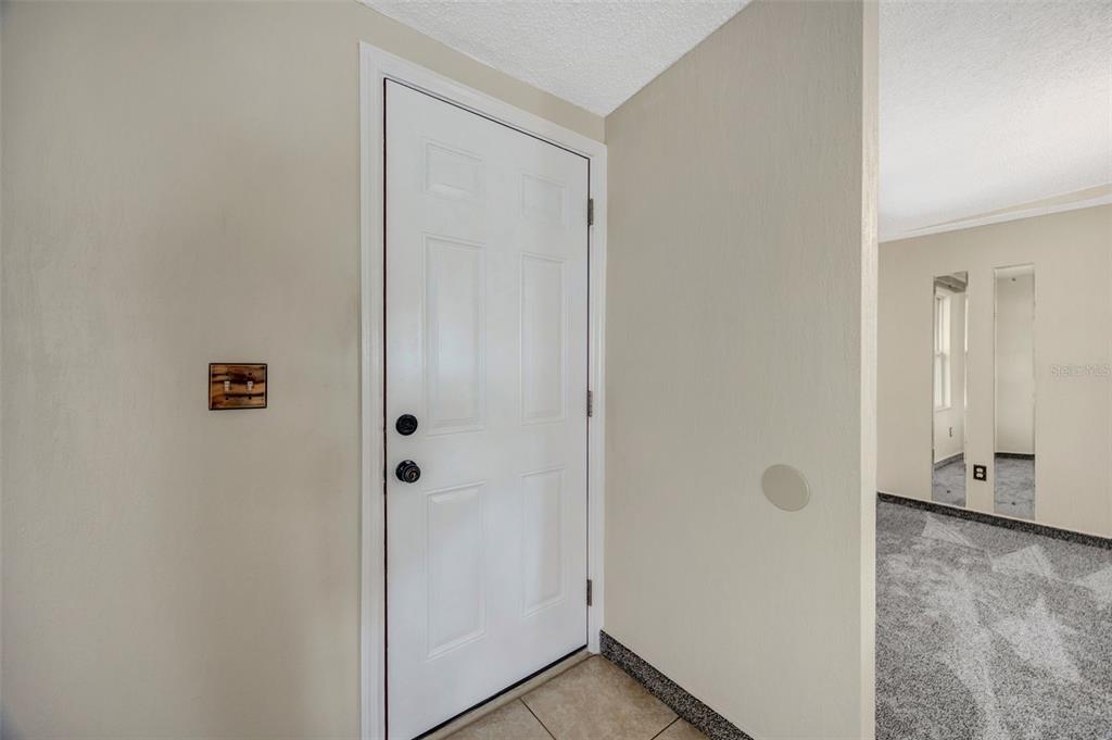 15615 Willowdale Road Tampa, FL 33625 - Photo 13 of 39 a view of a livingroom with wooden floor