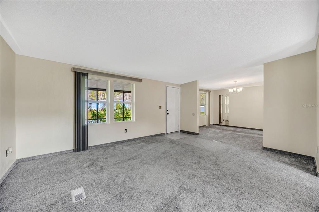 15615 Willowdale Road Tampa, FL 33625 - Photo 14 of 39 a view of a big room with windows and closet