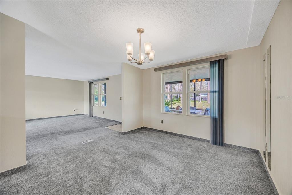 15615 Willowdale Road Tampa, FL 33625 - Photo 21 of 39 a view of an empty room with a window