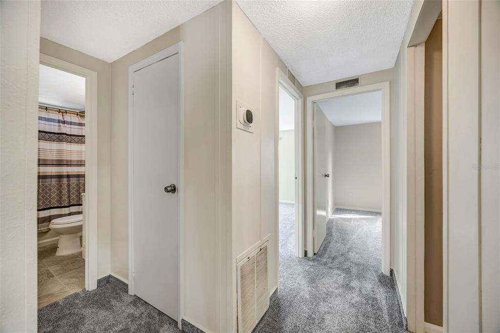 15615 Willowdale Road Tampa, FL 33625 - Photo 28 of 39 a view of a bathroom from the hallway