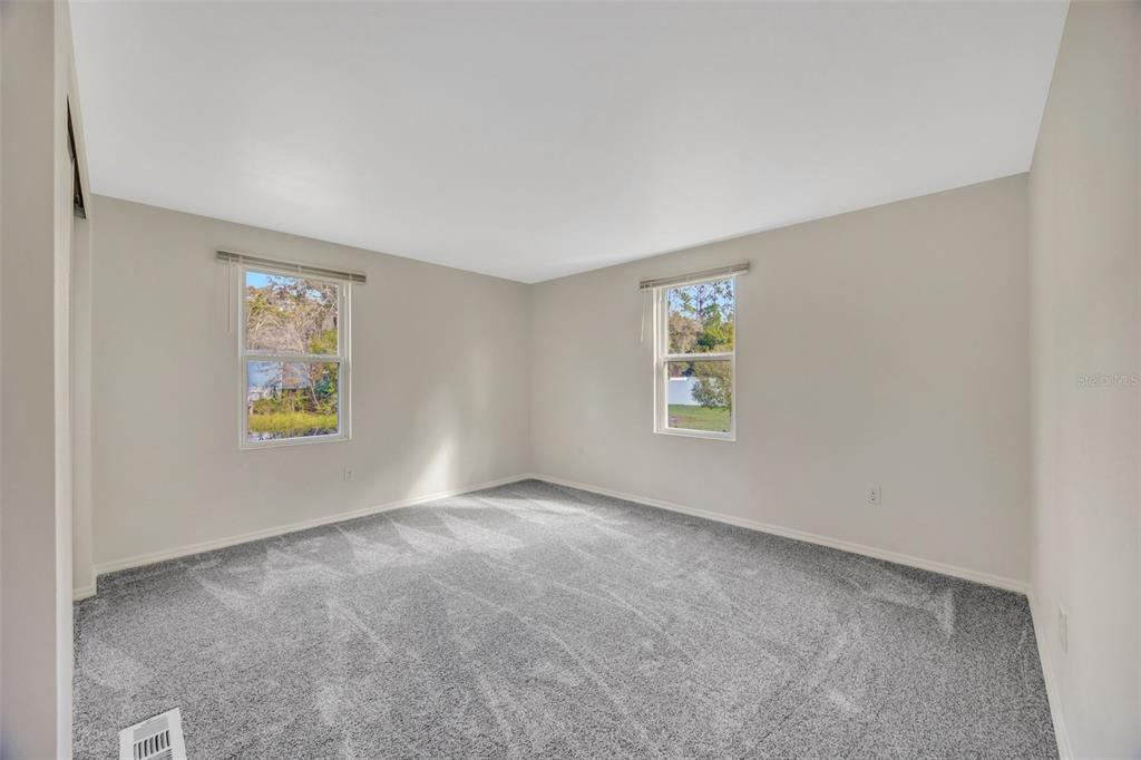 15615 Willowdale Road Tampa, FL 33625 - Photo 30 of 39 an empty room with windows