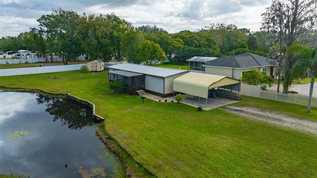 15615 Willowdale Road Tampa, FL 33625 - Photo 8 of 39 a view of a patio with a yard