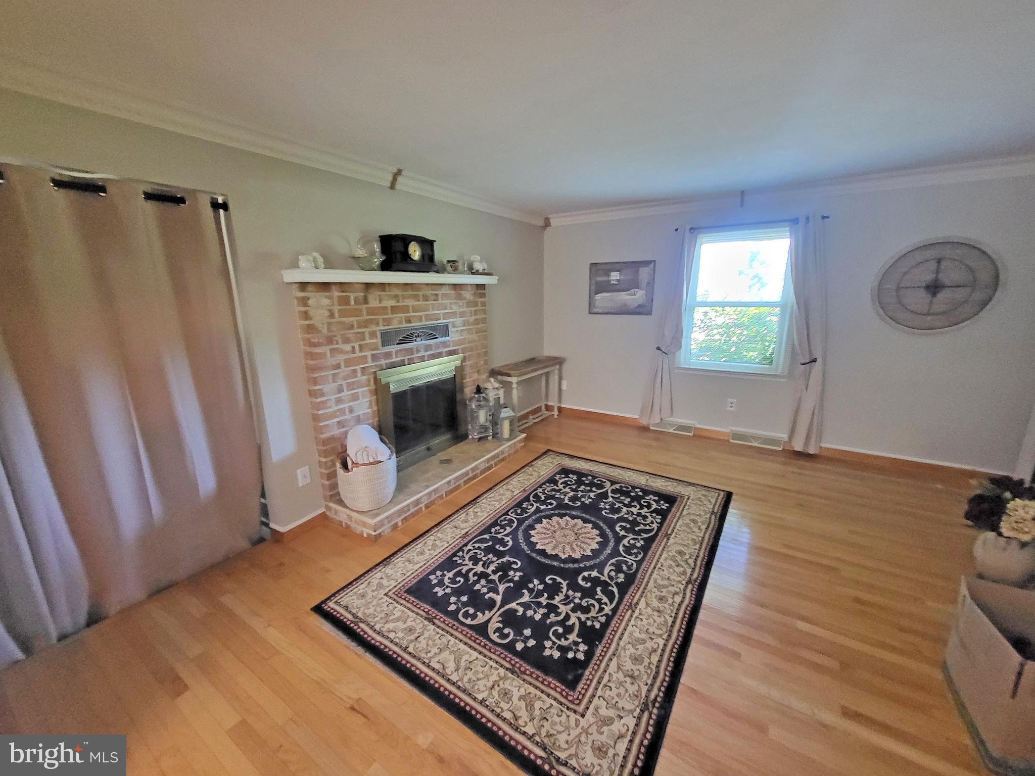 90 Knoxlyn-Orrtanna Road Gettysburg, PA 17325 - Photo 13 of 32 a living room with a fireplace