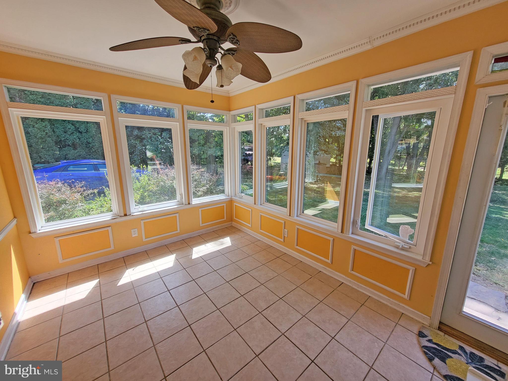 90 Knoxlyn-Orrtanna Road Gettysburg, PA 17325 - Photo 16 of 32 a view of an empty room with a floor to ceiling window and a ceiling fan