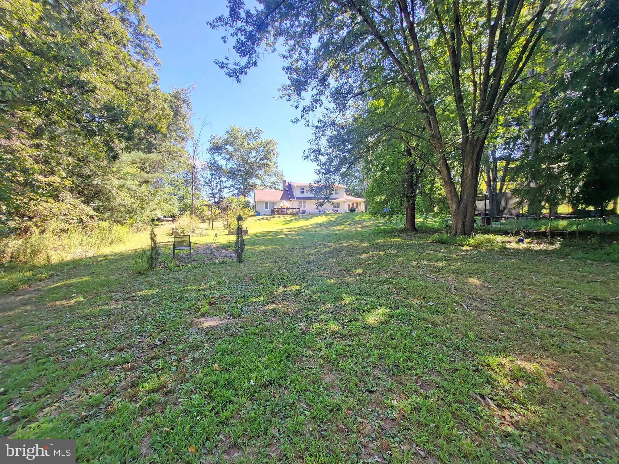 90 Knoxlyn-Orrtanna Road Gettysburg, PA 17325 - Photo 25 of 32 a green field with lots of trees