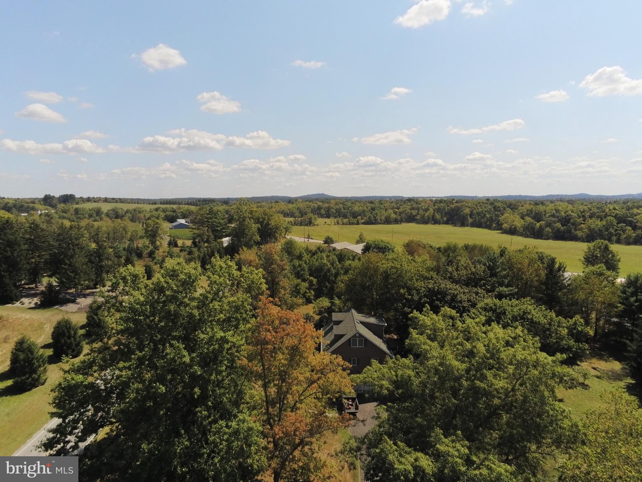 90 Knoxlyn-Orrtanna Road Gettysburg, PA 17325 - Photo 31 of 32 a view of a lake with houses in back