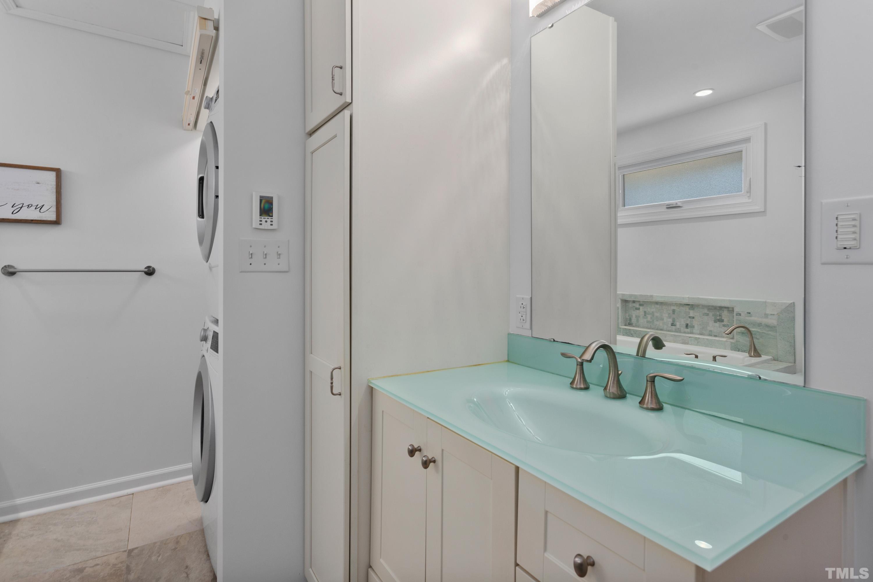 3905 Peppertree Place Raleigh, NC 27604 - Photo 14 of 25 a bathroom with a sink and a mirror