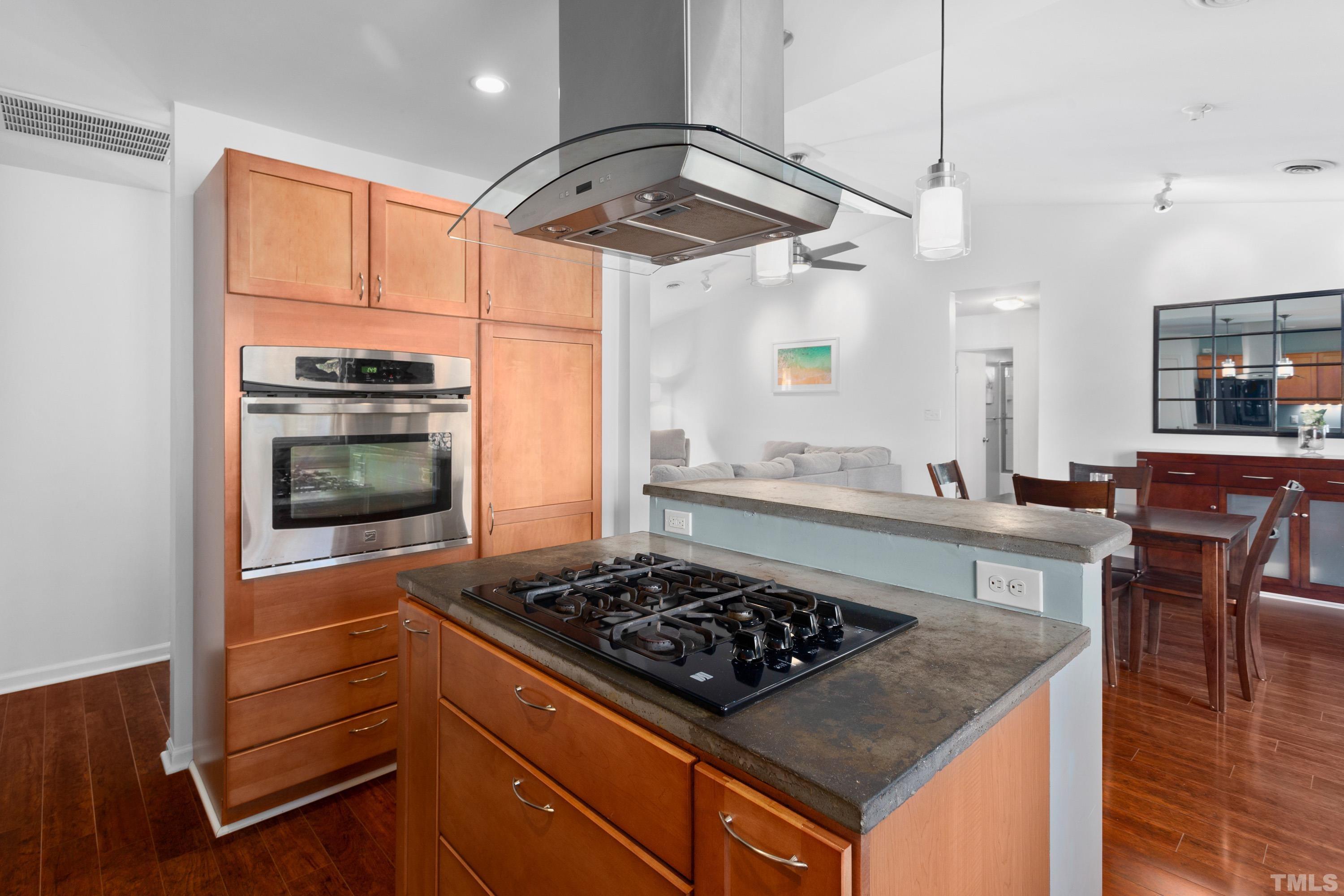 3905 Peppertree Place Raleigh, NC 27604 - Photo 8 of 25 a kitchen with a stove and a refrigerator