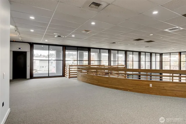 a view of empty room with windows