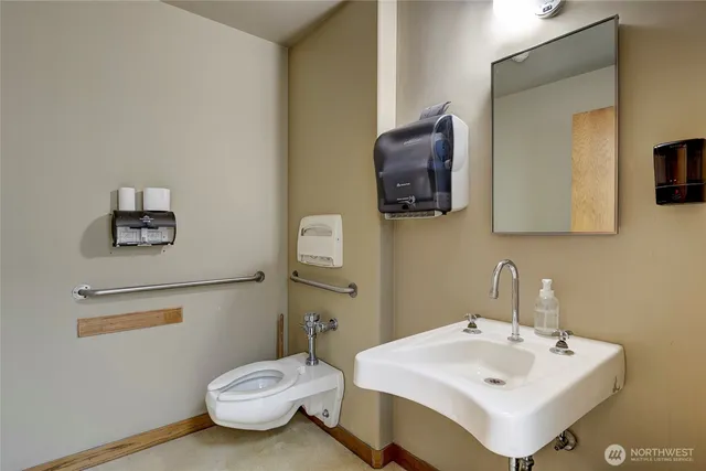 a kitchen with stainless steel appliances a refrigerator and a sink