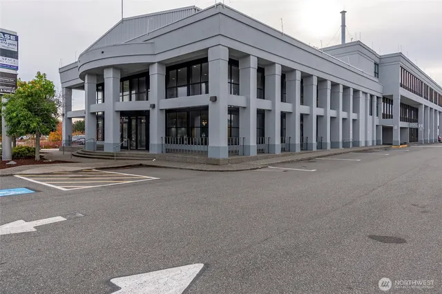 a front view of a building with a street