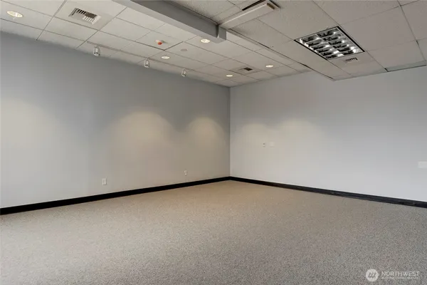 a view of a livingroom with wooden floor