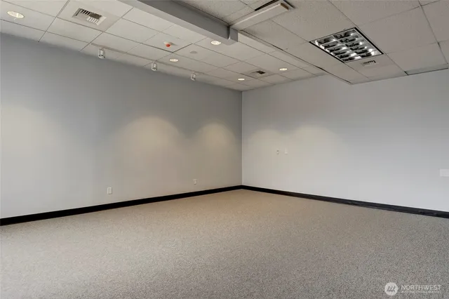 a view of a livingroom with wooden floor