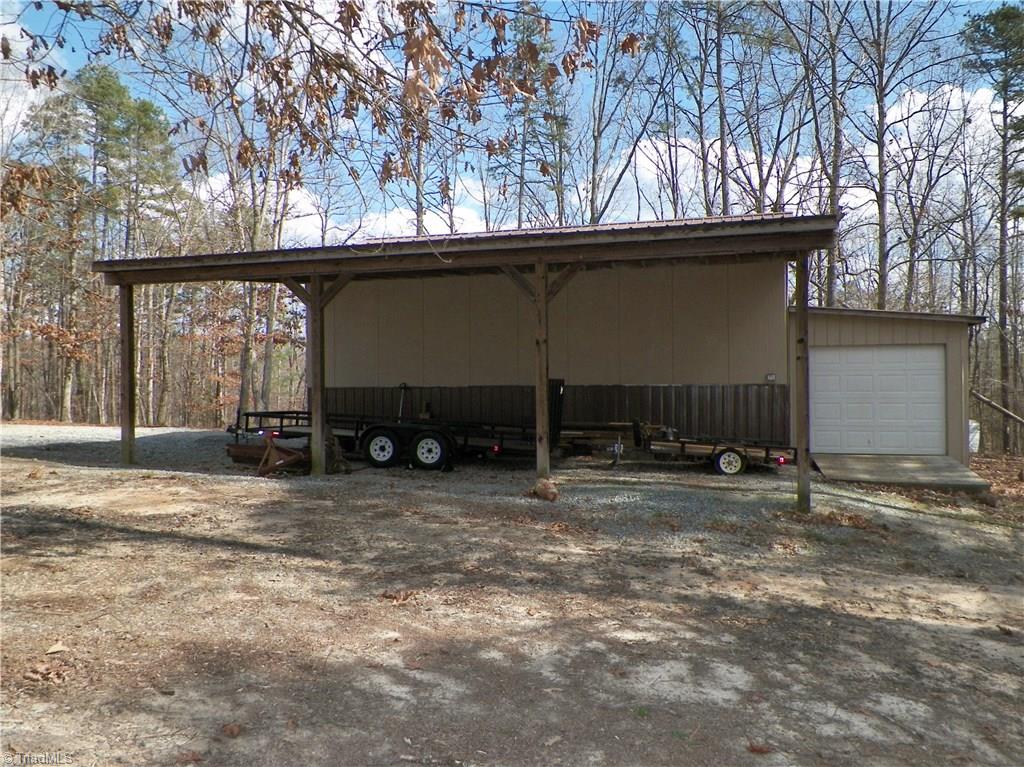 3590 Simerson Road Linwood, NC 27299 - Photo 24 of 28 Covered Storage Area & Enclosed Shed