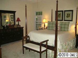 875 Knightsbridge Road Fort Mill, SC 29708 - Photo 5 of 8 a bedroom with a bed window and dresser